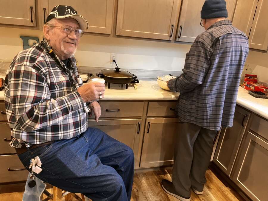 Men making pancakes in the church kitchen