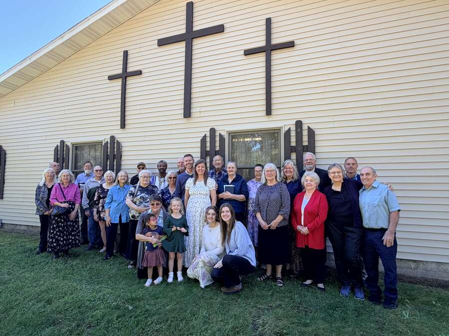 Pullman Bible Church congregation gathered for a group photo outside the church